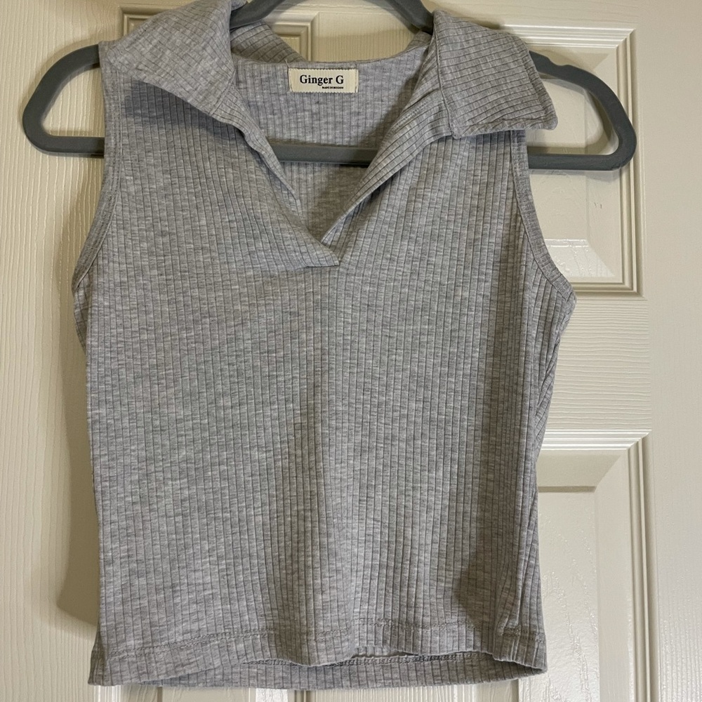 Gray collared cropped tank.